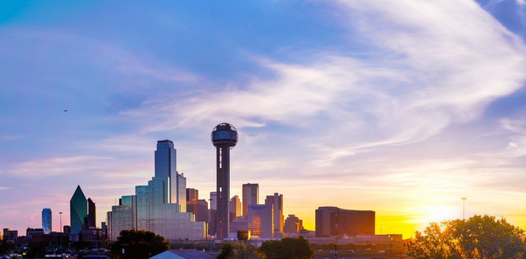 Dallas skyline at sunset - Smooth Moves Texas long distance moving services